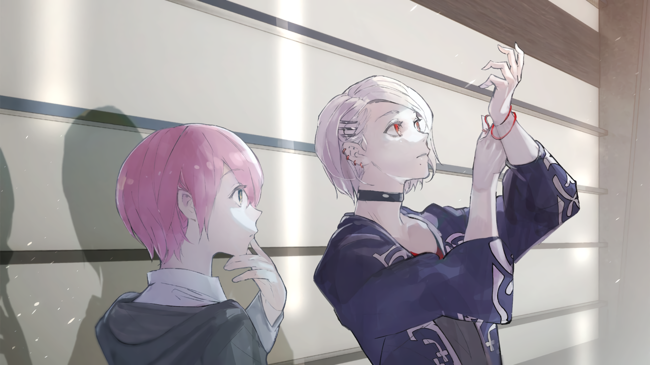 JackJeanne: Fumi Kisa, who is short with short pink hair, looks at Fumi, who is taller with a short blonde bob, multiple earrings, and wide sleeved black shirt. Fumi is holding up his arm and looking at some red bracelets he's wearing.